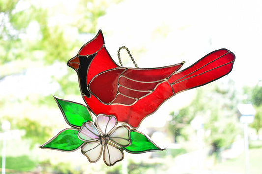 Cardinals with a Dogwood Flower